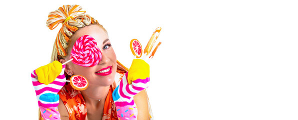 Obraz na płótnie Canvas Woman colorful orange hair braids. Attractive woman with lollipop in hand on white background. Girl braids, lollipops. Sexy girl eating lollipop, holding pink sweet colorful lollipop candy, sweets