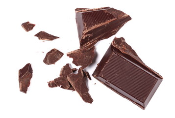 Chopped dark chocolate isolated on white, top view