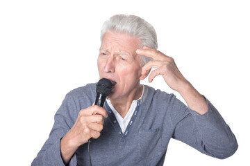 old man singing with microphone on white background