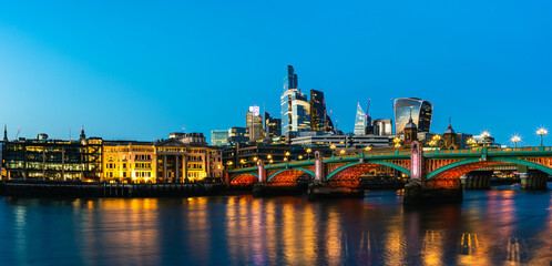 Night in London, Southwark Bridge ane Skyscrapers over River Thames, London, England