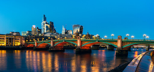 Fototapeta na wymiar Night in London, Southwark Bridge ane Skyscrapers over River Thames, London, England