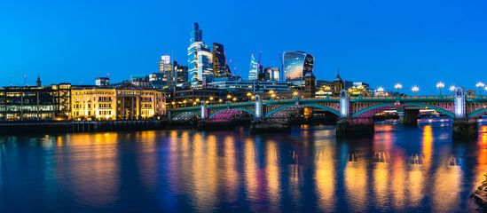 Night in London, Southwark Bridge ane Skyscrapers over River Thames, London, England