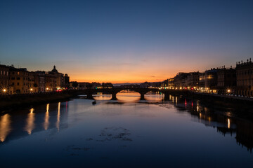Fototapeta na wymiar Bridge in Florence, Italy during sunset and blue hour