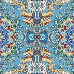 Hand drawn seamless graphic pattern, colorful artistic background with floral and geometric elements. Doodle ethnic mandala ornament for textile fabric, paper print. Surface texture 