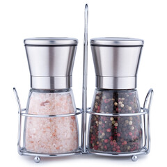 Glass pepper mill and salt shaker with stainless steel lids.