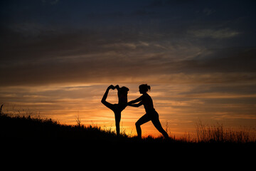 people doing sports in nature, people doing yoga in nature, sunset yoga, sports, running, yoga


