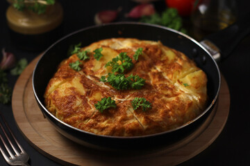 Traditional Spanish dish tortilla on the table
