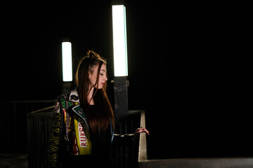 Young Adult in the Nights Darkness with Long Hair