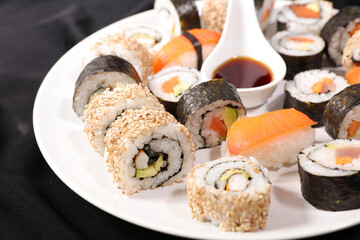 plate of various sushi roll