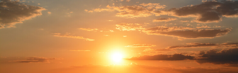 Fototapeta na wymiar Sun shining on beautiful cloudy sky at sunset, banner design