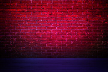 Room with brick wall and wooden floor in neon lights