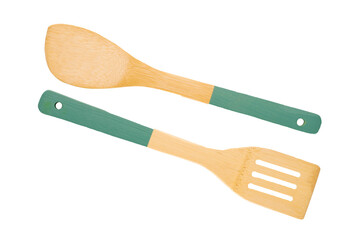 Two wooden spoons for kitchen isolated on white background, macro, top view.