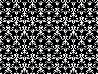 Floral pattern. Vintage wallpaper in the Baroque style. Seamless vector background. White and black ornament for fabric, wallpaper, packaging. Ornate Damask flower ornament