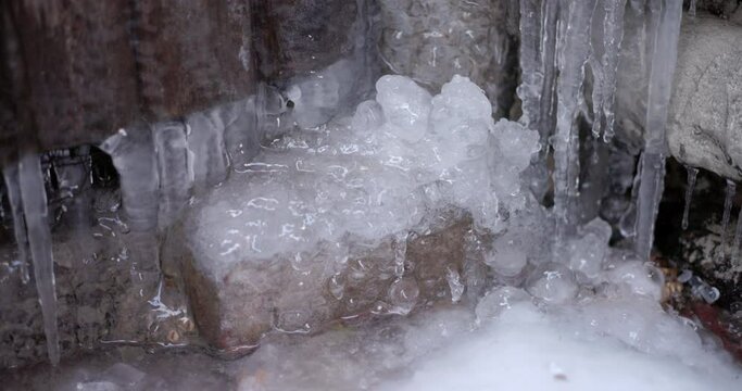 Close-up of melting icicles, ice at the end of winter, the concept of spring
