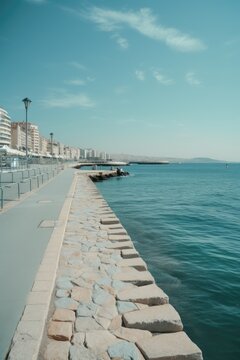 General view of promenade, buildings, sea and sky created using generative ai technology