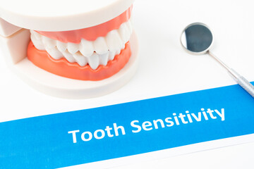 The Dentures model with tooth sensitivity dental disease on white background.
