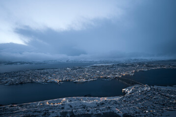 Cloudy view of the beautiful city of Tromsdalen, Norway