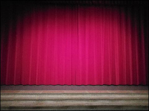 stage with red curtains