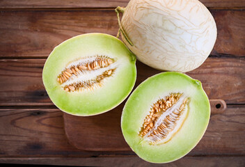 cantaloupe melon on wooden plate, cantaloupe thai slice fruit for health green cantaloupe thailand