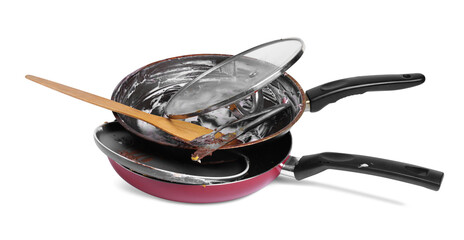 Stack of dirty kitchenware on white background