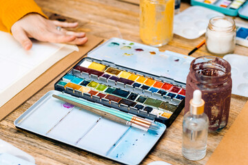 Watercolor Painting Workshop. Close-up of a used watercolor box