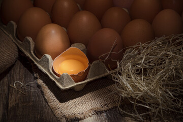 Freshly picked chicken eggs on a rustic background © Jan Kravа