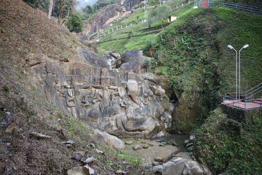 Unakoti , A popular tourist spot in Tripura with Lord Ganesha curved on the wall of the mountain.