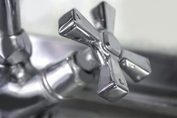 Water. Tap water. Chrome faucet.