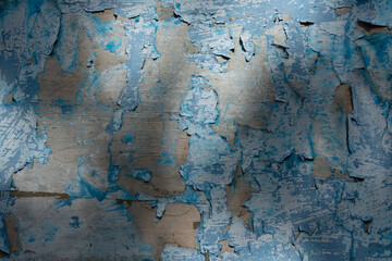 Closeup shot of an old blue weathered wooden wall texture