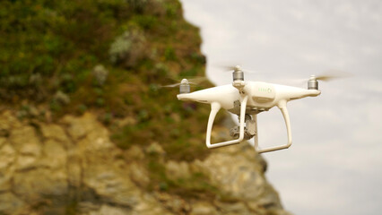 Selective focus shot of a drone captured in midflight