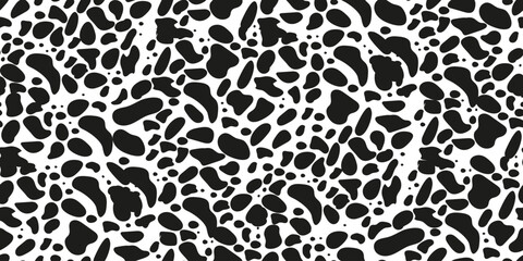 Seamless pattern with animal print dolmatian. Black spots. Suitable for printing and textiles.