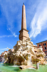 Fountain of Four Rivers (Fontana dei Quattro Fiumi) with obelisk on Navona square, Rome, Italy