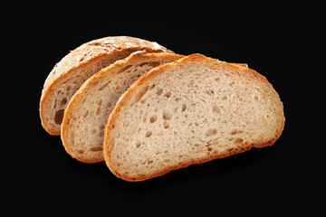 Sliced bread. Bread slices on a black background. The concept of a healthy food
