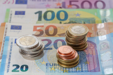 Closeup shot of euro coins and Euro banknotes