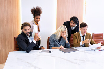 Fototapeta premium Employee on job corporate Business colleagues around the table making strong business team