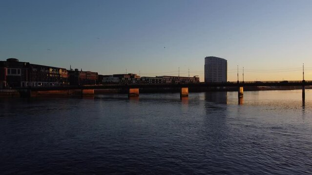 Bird's-eye view of a bridge over the Shannon River in the sunset, Ireland