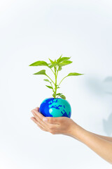 Hands holding earth drawn plant pot. Environment protection concept.