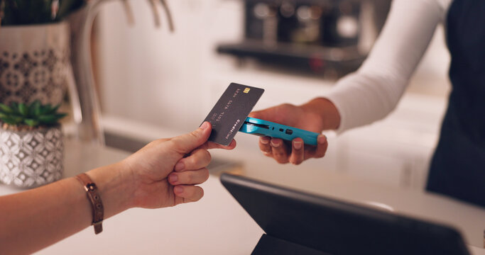 Pos, hands of woman and payment with credit card in coffee shop with barista at counter with financial freedom. Future, technology and customer paying for service in cashless tap transaction at cafe.