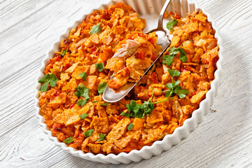 nacho chicken cheese casserole in baking dish