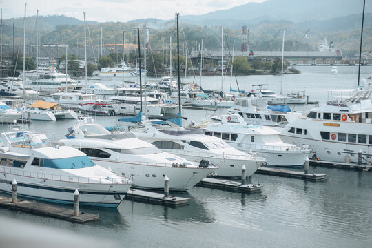 White line of yachts inside the Subic Bay in the water in Olongapo city, Philippines