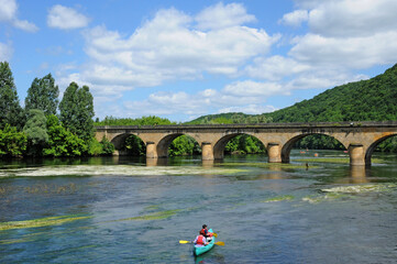 Perigord, the picturesque bridge of Castelnaud in Dordogne