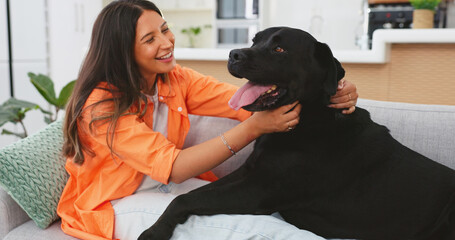 Happy woman relax with her dog on sofa for mental health, wellness or emotional support, love and...