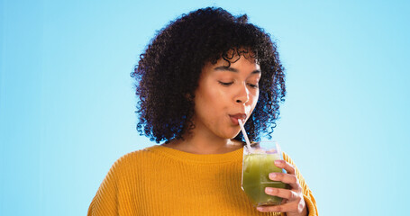 Green juice, black woman drinking and healthy smoothie of a person with weight loss drink. Studio,...