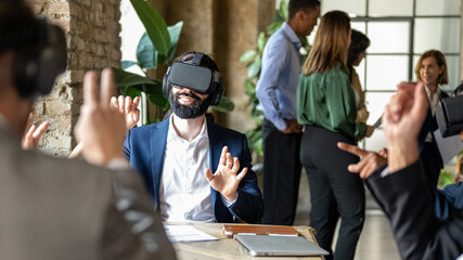 business people using augmented reality headset for a virtual meeting, senior businessman scrolling documents in virtual space and searching information reports, futuristic business workplace