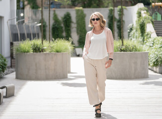 Portrait of Beautiful White Caucasian Adult Woman She is Wearing Active Lifestyle Outdoor Sportwear.