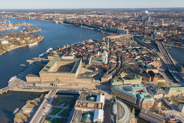 Fototapeta premium Stockholm Old Town and Royal Palace in Background. It is located in Gamla Stan Island in Stockholm, Sweden. Drone Point of View
