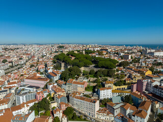 Fototapeta na wymiar Lisbon City Downtown and City Center, Portugal. Drone Point of View. Sightseeing Places and Famous Architecture Buildings. Castle in Background