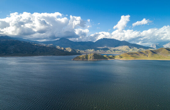Isabella Lake in California. Beautiful Cloudy Sky and Mountain in Background. Bright Sunny Day. USA