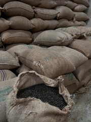 textile bag filled with roasted coffee beans waiting to be sold, Sidama, Ethipoia
