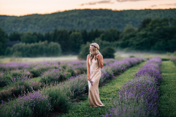 Woman standing in lavender field